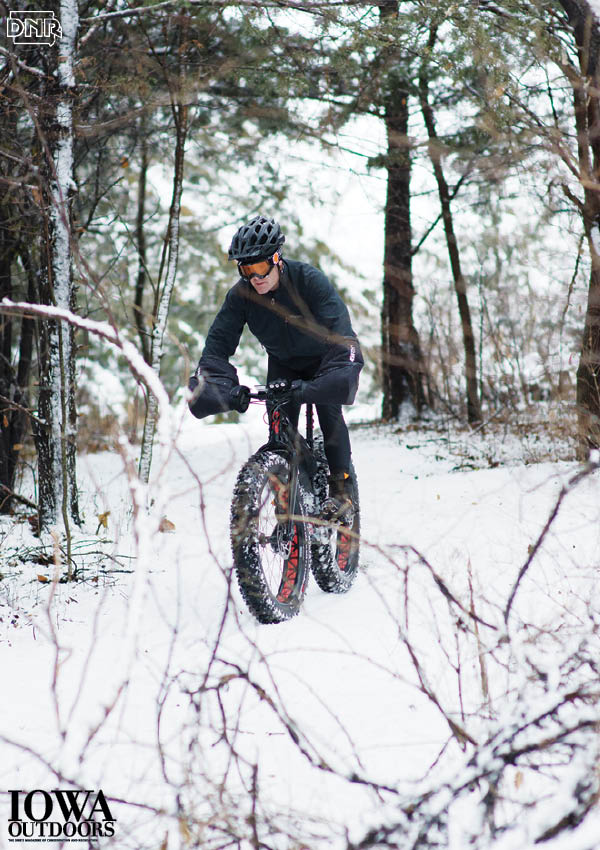 Conquer winter on a fat bike! These heavy-duty bikes sport tires near 4 inches wide, which allows them to go where most road and mountain bikes can’t. The oversized tires’ extra surface area gives the bike traction on mud, snow, sand and other slippery surfaces, and the inflation can be adjusted to absorb impact. | Iowa DNR